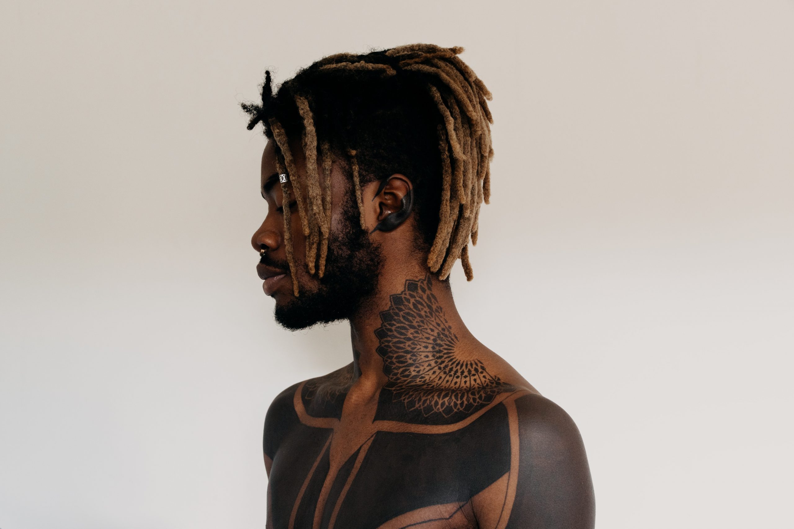 15 Beautiful Tattoos on Black Skin  Embracing Identity and Empowerment   Psycho Tats
